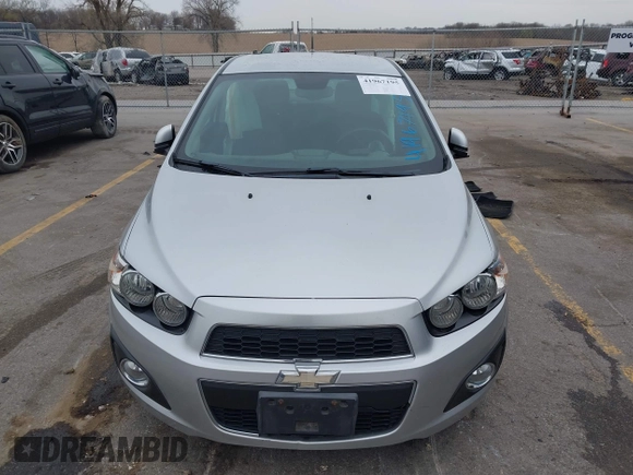 2012 Chevrolet Sonic LT with VIN 1G1JC5SH0C4162034, listed as a IAAI auction lot 41967195 with 87,086 mi miles and . Bid and sale history available at DreamBid. Image 12.