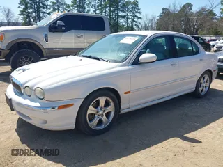 2002 Jaguar X-Type with VIN SAJEA51C22WC27350, listed as a IAAI auction lot 41778528 with 163,600 mi miles and . Bid and sale history available at DreamBid. Image 2.