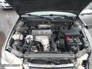 2000 Toyota Camry CE with VIN 4T1BG22K4YU678040, listed as a IAAI auction lot 42012146 with 112,714 mi miles. Bid and sale history available at carsss.com. Image 10.