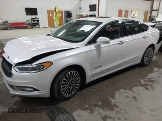2018 Ford Fusion Titanium with VIN 3FA6P0RU1JR185937, listed as a IAAI auction lot 41863378 with 133,641 mi miles and . Bid and sale history available at DreamBid. Image 2.