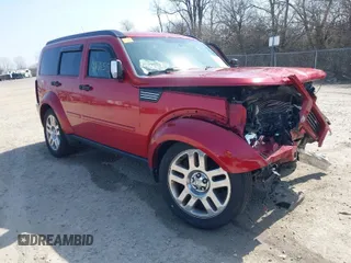 2011 Dodge Nitro Heat with VIN 1D4PU4GXXBW517547, listed as a IAAI auction lot 41785509 with 233,240 mi miles. Bid and sale history available at carsss.com. Image 1.