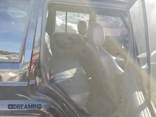 2001 Jeep Cherokee Sport z VIN 1J4FF58S61L612533, wystawiony jako Copart lot #76824714 z przebiegiem 62 401 mil mil oraz Szkoda całkowita • Salvage title. Historia ofert i sprzedaży dostępna na DreamBid. Obrazek 10.