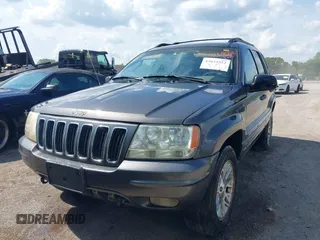 2002 Jeep Grand Cherokee Limited with VIN 1J4GW58J02C163931, listed as a IAAI auction lot 42632552 with 228,955 mi miles and . Bid and sale history available at DreamBid. Image 6.