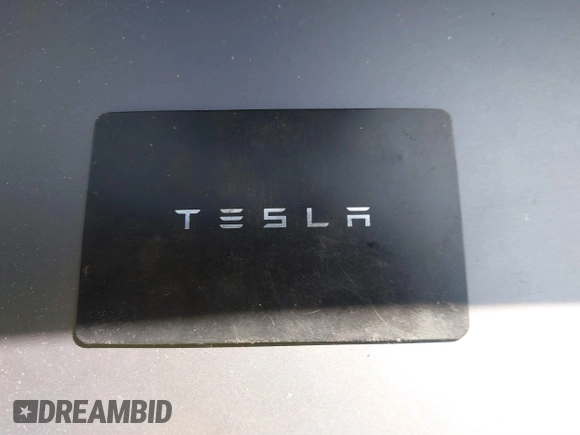 2021 Tesla Model 3 Long Range with VIN 5YJ3E1EBXMF990242, listed as a IAAI auction lot 41674222 with 24,554 mi miles and . Bid and sale history available at DreamBid. Image 11.