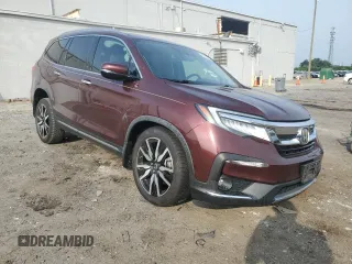 2020 Honda Pilot Touring 8-Passenger with VIN 5FNYF6H96LB028737, listed as a Copart auction lot 60435635 with 115,023 mi miles and Salvage title. Bid and sale history available at DreamBid. Image 4.