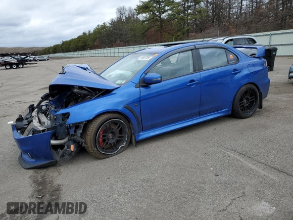 2015 Mitsubishi Lancer Evolution GSR z VIN JA32W8FV7FU023106, wystawiony jako Copart lot #40867084 z przebiegiem 103 964 mil mil oraz Szkoda całkowita • Salvage title. Historia ofert i sprzedaży dostępna na DreamBid. Obrazek 1.