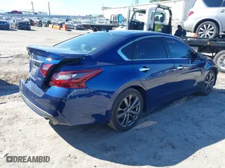 2018 Nissan Altima 2.5 SL with VIN 1N4AL3AP1JC294068, listed as a IAAI auction lot 41639471 with 100,772 mi miles. Bid and sale history available at carsss.com. Image 4.