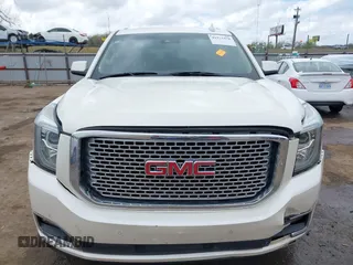 2015 GMC Yukon Denali with VIN 1GKS2CKJ7FR737165, listed as a IAAI auction lot 41914478 with 156,059 mi miles. Bid and sale history available at carsss.com. Image 12.