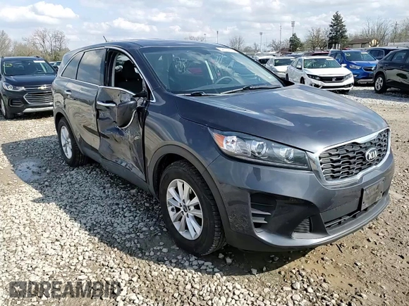 2019 Kia Sorento LX z VIN 5XYPG4A57KG486900, wystawiony jako Copart lot #52674115 z przebiegiem 105 259 mil mil oraz Szkoda całkowita • Salvage title. Historia ofert i sprzedaży dostępna na DreamBid. Obrazek 12.