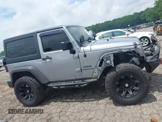 2016 Jeep Wrangler Black Bear with VIN 1C4AJWAG5GL258426, listed as a IAAI auction lot 42400914 with 128,606 mi miles and . Bid and sale history available at DreamBid. Image 13.