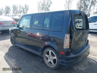 2004 Scion xB with VIN JTLKT324840149980, listed as a IAAI auction lot 41670229 with 193,674 mi miles. Bid and sale history available at carsss.com. Image 3.