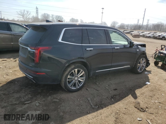 2023 Cadillac XT6 FWD Premium Luxury with VIN 1GYKPCRS4PZ103061, listed as a Copart auction lot 49300205 with 72,131 mi miles and Salvage title. Bid and sale history available at DreamBid. Image 3.