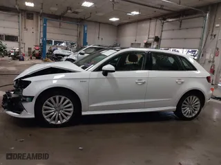 2016 Audi A3 e-tron Premium Plus with VIN WAUTPBFF2GA100666, listed as a IAAI auction lot 41315165 with 98,549 mi miles. Bid and sale history available at carsss.com. Image 15.