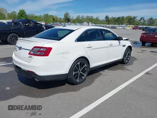 2016 Ford Taurus SEL with VIN 1FAHP2E88GG131659, listed as a IAAI auction lot 42205065 with 99,416 mi miles and . Bid and sale history available at DreamBid. Image 4.