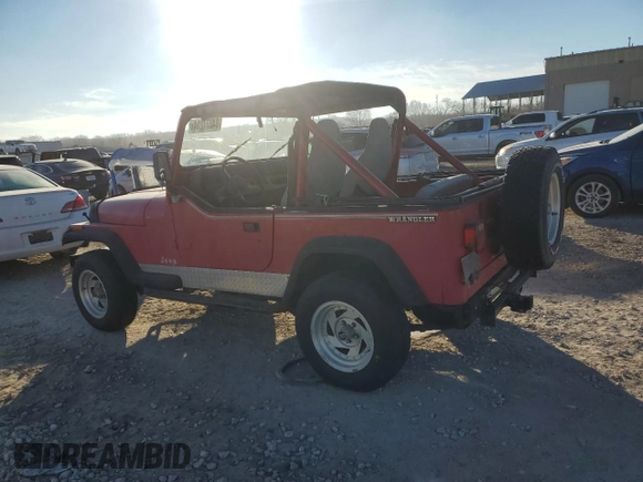 1991 Jeep Wrangler z VIN 2J4FY19P6MJ107521, wystawiony jako Copart lot #84077214 z przebiegiem 1 311 216 mil mil oraz Czysty tytuł • Clean title. Historia ofert i sprzedaży dostępna na DreamBid. Obrazek 2.