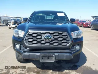 2021 Toyota Tacoma SR z VIN 3TMCZ5AN3MM421868, wystawiony jako IAAI lot #42003665 z przebiegiem 39 380 mil mil oraz . Historia ofert i sprzedaży dostępna na DreamBid. Obrazek 12.