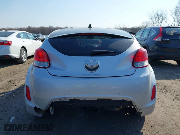 2012 Hyundai Veloster w/Black Int with VIN KMHTC6AD7CU063968, listed as a IAAI auction lot 41764263 with 83,634 mi miles and . Bid and sale history available at DreamBid. Image 16.