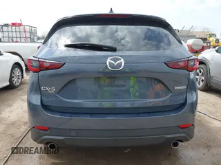 2022 Mazda CX-5 S Preferred with VIN JM3KFBCM2N0528204, listed as a IAAI auction lot 42054842 with 32,066 mi miles and . Bid and sale history available at carsss.com. Image 16.