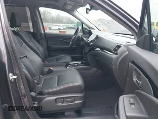 2021 Honda Pilot Touring 8-Passenger with VIN 5FNYF5H9XMB014190, listed as a IAAI auction lot 41749586 with 67,602 mi miles and . Bid and sale history available at DreamBid. Image 5.