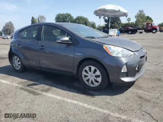 2014 Toyota Prius c One with VIN JTDKDTB34E1573233, listed as a Copart auction lot 54385895 with 107,094 mi miles and Clean Title. Bid and sale history available at carsss.com. Image 4.