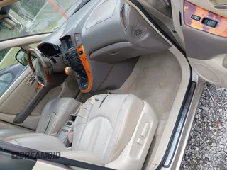 2002 Lexus RX 300 with VIN JTJGF10U220135180, listed as a IAAI auction lot 42646437 with 184,559 mi miles and . Bid and sale history available at DreamBid. Image 5.