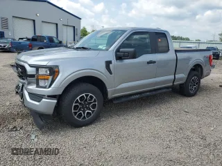 2023 Ford F-150 XL with VIN 1FTEX1EP9PKE34381, listed as a Copart auction lot 63938505 with 13,933 mi miles and Salvage title. Bid and sale history available at DreamBid. Image 1.