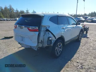 2017 Honda CR-V EX-L with VIN 2HKRW2H81HH673048, listed as a IAAI auction lot 41293944 with 97,904 mi miles. Bid and sale history available at carsss.com. Image 4.