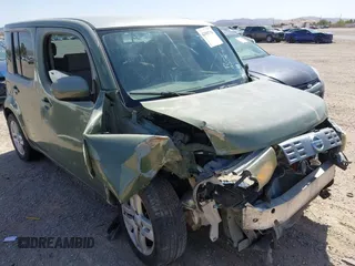 2009 Nissan Cube S z VIN JN8AZ28RX9T107761, wystawiony jako IAAI lot #42083756 z przebiegiem 125 754 mil mil oraz . Historia ofert i sprzedaży dostępna na DreamBid. Obrazek 1.