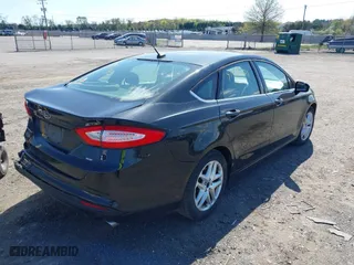2015 Ford Fusion SE with VIN 3FA6P0H75FR301708, listed as a IAAI auction lot 41970871 with 113,863 mi miles. Bid and sale history available at carsss.com. Image 4.