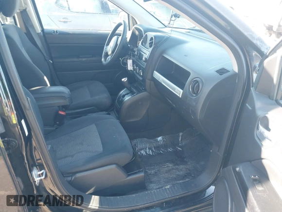 2016 Jeep Compass Sport with VIN 1C4NJCBA8GD560507, listed as a IAAI auction lot 41819228 with 123,294 mi miles and . Bid and sale history available at DreamBid. Image 5.