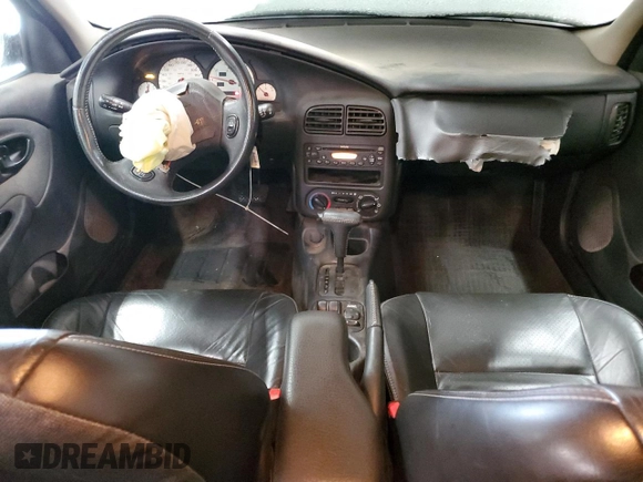 2001 Saturn SL with VIN 1G8ZK54791Z298951, listed as a Copart auction lot 89198795 with 157,208 mi miles and Salvage title. Bid and sale history available at DreamBid. Image 8.