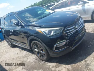 2017 Hyundai Santa Fe Ultimate z VIN 5NMZW4LA1HH052430, wystawiony jako IAAI lot #42205489 z przebiegiem 85 720 mil mil oraz . Historia ofert i sprzedaży dostępna na DreamBid. Obrazek 1.