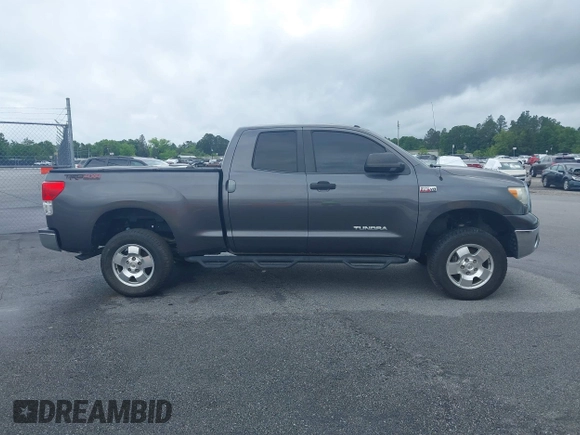 2012 Toyota Tundra z VIN 5TFUW5F10CX265994, wystawiony jako IAAI lot #42172968 z przebiegiem 197 493 mil mil oraz . Historia ofert i sprzedaży dostępna na DreamBid. Obrazek 13.