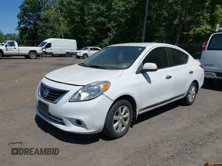 2013 Nissan Versa SV with VIN 3N1CN7AP2DL876518, listed as a IAAI auction lot 42409472 with Not provided miles and . Bid and sale history available at DreamBid. Image 2.