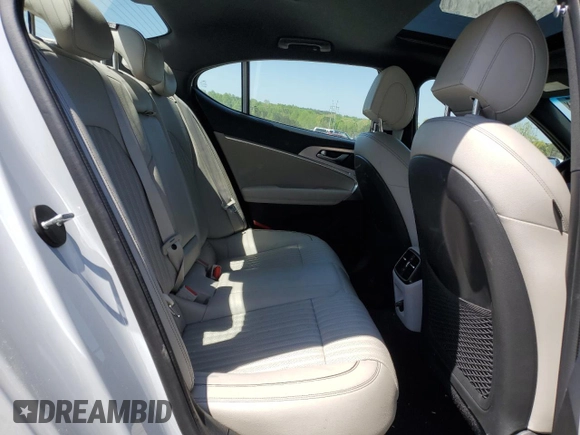 2022 Genesis G70 2.0T z VIN KMTG34TA0NU089619, wystawiony jako Copart lot #52154495 z przebiegiem 70 890 mil mil oraz Szkody całkowita. Historia ofert i sprzedaży dostępna na DreamBid. Obrazek 11.