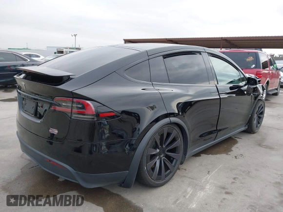 2023 Tesla Model X Plaid with VIN 7SAXCBE63PF376320, listed as a IAAI auction lot 40954738 with Not Provided miles and . Bid and sale history available at DreamBid. Image 4.