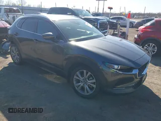 2022 Mazda CX-30 S Select with VIN 3MVDMBBL2NM442323, listed as a IAAI auction lot 41765707 with 40,848 mi miles and . Bid and sale history available at DreamBid. Image 1.