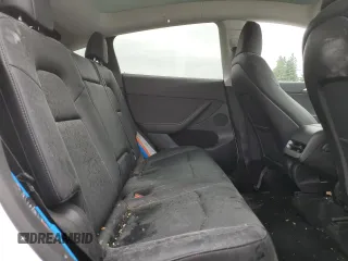 2023 Tesla Model Y Long Range z VIN 7SAYGDEE9PA081604, wystawiony jako Copart lot #60163785 z przebiegiem 42 134 mil mil oraz Szkoda całkowita • Salvage title. Historia ofert i sprzedaży dostępna na DreamBid. Obrazek 10.