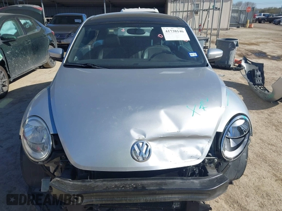 2013 Volkswagen Beetle 2.5L w/Sun/Sound/Nav with VIN 3VWJX7AT3DM663774, listed as a IAAI auction lot 41738146 with 98,064 mi miles and . Bid and sale history available at DreamBid. Image 12.