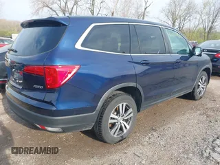 2018 Honda Pilot EX-L with VIN 5FNYF6H57JB026036, listed as a IAAI auction lot 42000454 with 110,996 mi miles and . Bid and sale history available at DreamBid. Image 4.