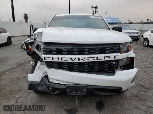 2021 Chevrolet Silverado 1500 Custom with VIN 1GCRWBEH9MZ122437, listed as a Copart auction lot 86158574 with 31,865 mi miles and Salvage Title. Bid and sale history available at DreamBid. Image 5.