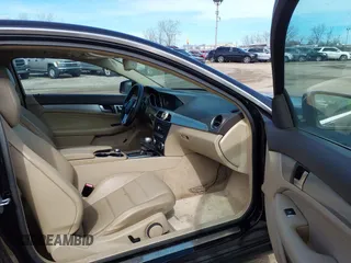 2012 Mercedes-Benz C-Class C 250 with VIN WDDGJ4HB4CF743051, listed as a IAAI auction lot 41765592 with 159,574 mi miles. Bid and sale history available at carsss.com. Image 5.