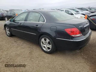 2007 Acura RL Technology z VIN JH4KB16697C002275, wystawiony jako Copart lot #82517284 z przebiegiem 200 857 mil mil oraz Czysty tytuł • Clean title. Historia ofert i sprzedaży dostępna na DreamBid. Obrazek 2.