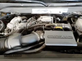 2019 Chevrolet Silverado 2500HD LTZ z VIN 1GC1KTEY1KF151170, wystawiony jako Copart lot #69631755 z przebiegiem 65 905 mil mil oraz Szkoda całkowita • Salvage title. Historia ofert i sprzedaży dostępna na DreamBid. Obrazek 13.