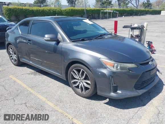 2015 Scion tC with VIN JTKJF5C74F3090309, listed as a IAAI auction lot 41988036 with 158,240 mi miles. Bid and sale history available at carsss.com. Image 1.