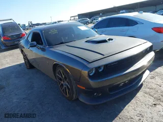 2019 Dodge Challenger R/T Scat Pack with VIN 2C3CDZFJXKH723881, listed as a IAAI auction lot 41348860 with 67,472 mi miles. Bid and sale history available at carsss.com. Image 1.