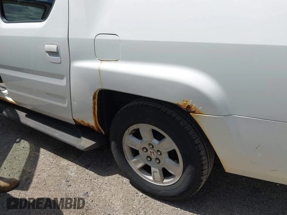2008 Honda Ridgeline RTS z VIN 2HJYK16488H529857, wystawiony jako IAAI lot #42212085 z przebiegiem 183 097 mil mil oraz . Historia ofert i sprzedaży dostępna na DreamBid. Obrazek 18.