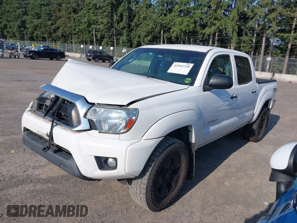 2015 Toyota Tacoma with VIN 3TMLU4EN5FM182720, listed as a IAAI auction lot 42555728 with 183,081 mi miles and . Bid and sale history available at DreamBid. Image 14.