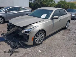 2014 Cadillac CTS Luxury RWD z VIN 1G6AR5SX4E0141195, wystawiony jako IAAI lot #42144565 z przebiegiem 80 267 mil mil oraz . Historia ofert i sprzedaży dostępna na DreamBid. Obrazek 16.