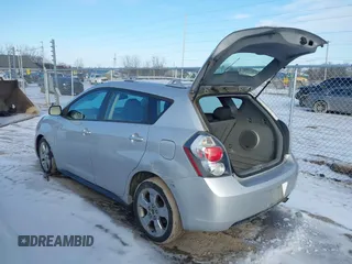 2009 Pontiac Vibe with VIN 5Y2SM67069Z453831, listed as a IAAI auction lot 41526347 with 163,468 mi miles. Bid and sale history available at carsss.com. Image 3.